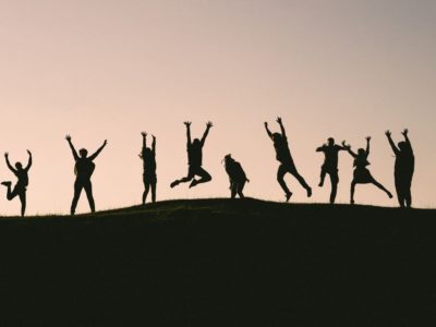 silhouette of people celebrating