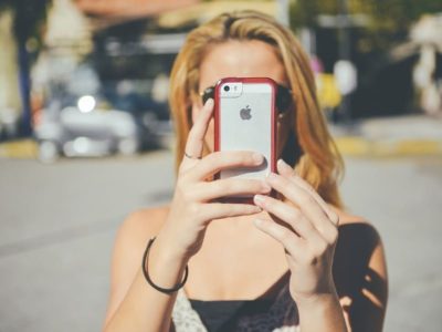 a girl taking a photo