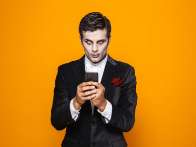 shocked zombie holding a phone