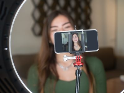 girl recording herself on her smartphone