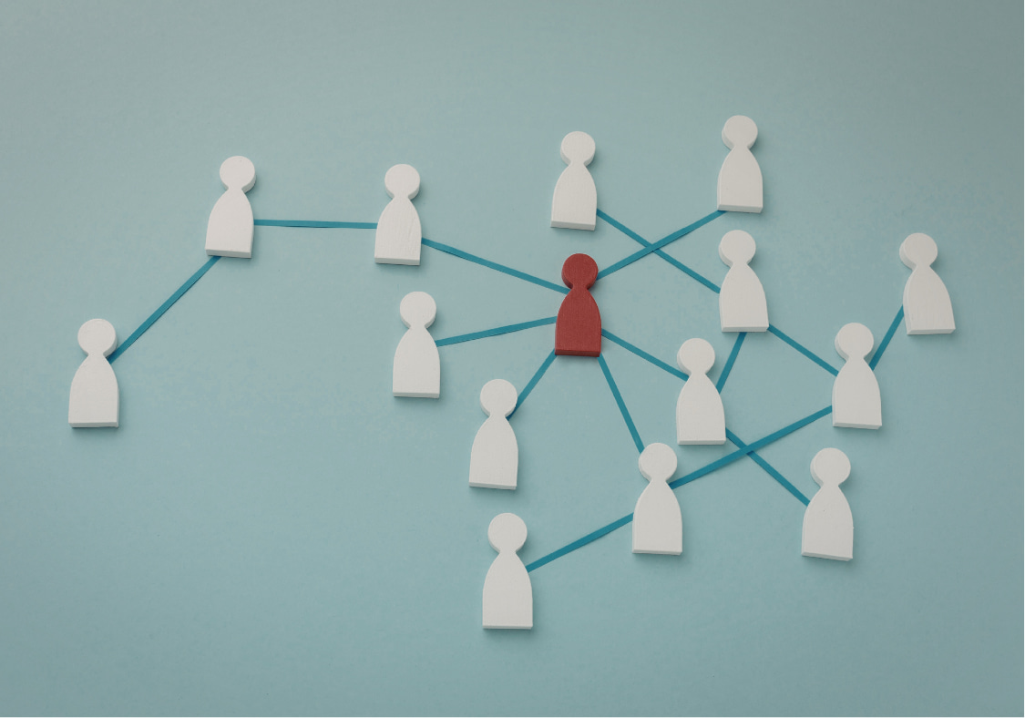Illustration of one red figure connected to multiple white figures, representing data silo problems solved by centralizing contacts in a CRM